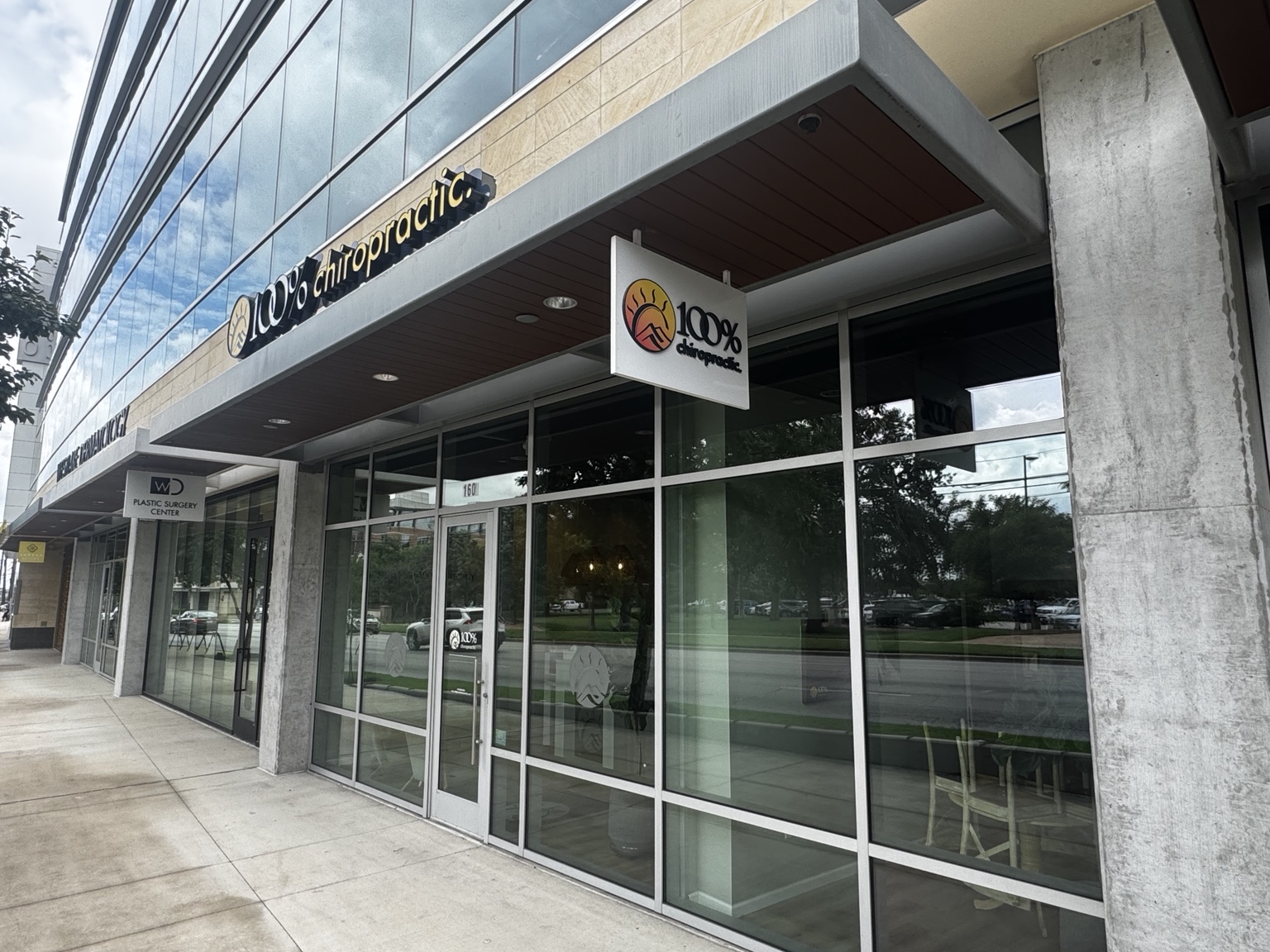 Exterior storefront for 100% Chiropractic Austin Rosedale.