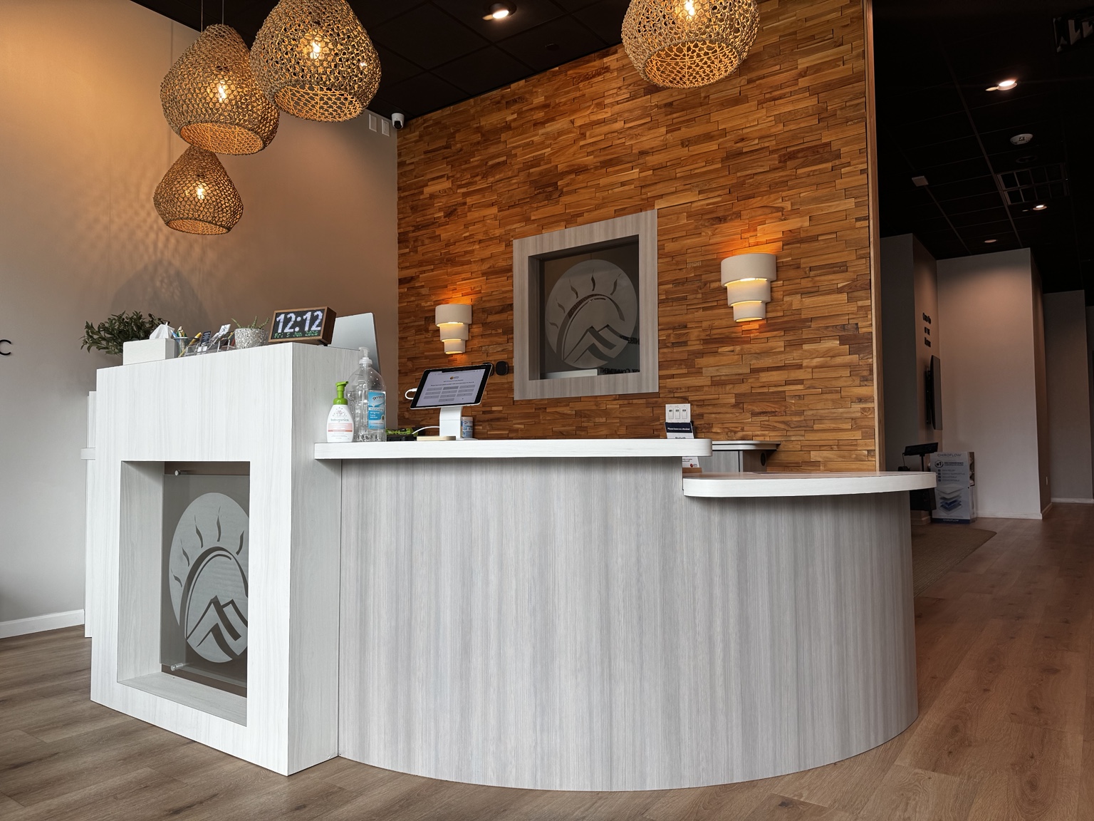 Front desk and reception area at 100% Chiropractic Austin Rosedale.